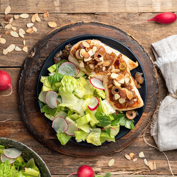 Chicken with roasted almonds and salad