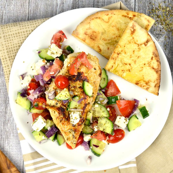 Marinated Greek chicken breasts and crispy pita bread