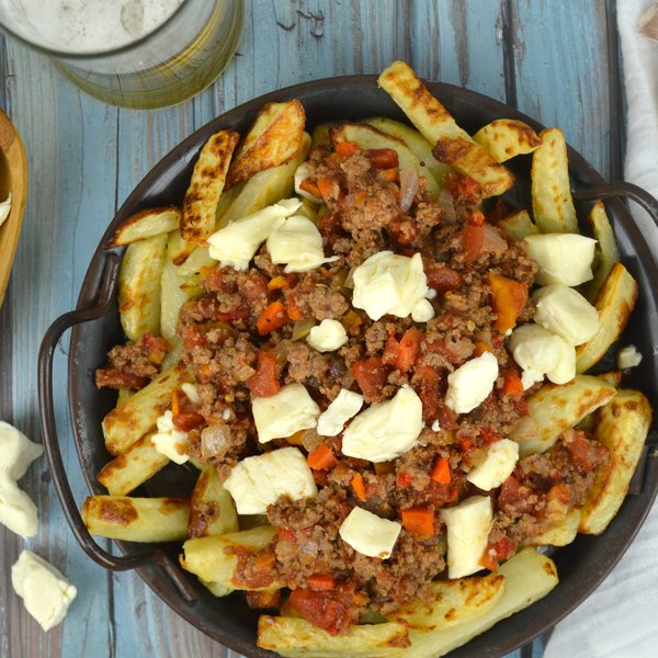 Italian bolognese poutine with beef and cheese curds
